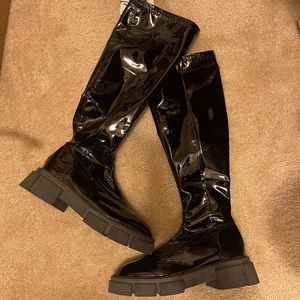 Black patent knee high boots